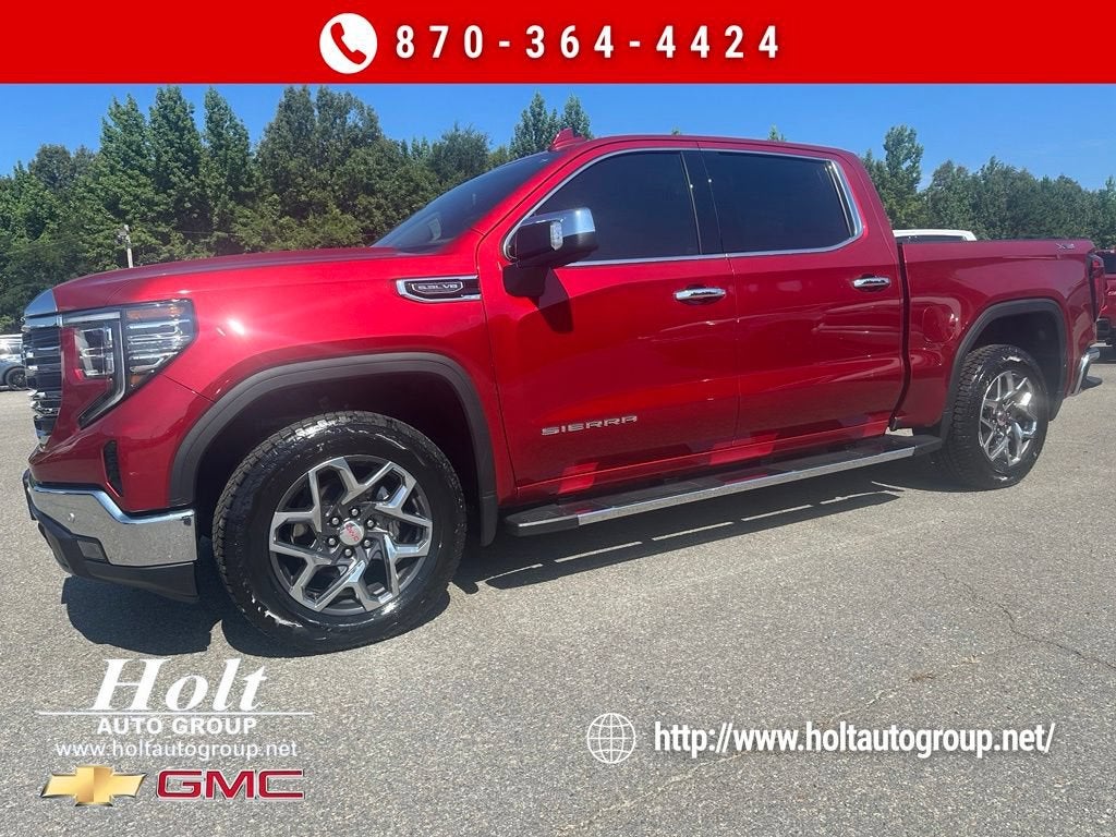 2025 GMC Sierra 1500 SLT in Volcanic Red Tintcoat — front three-quarter view